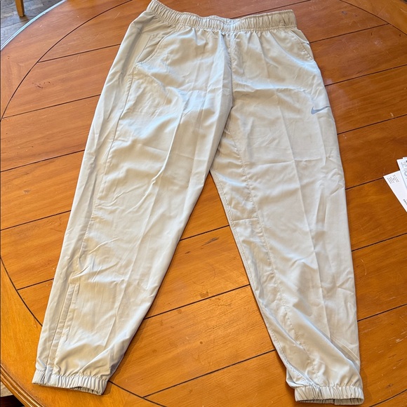 Nike Other - Men’s Nike form dry-fit tapered, versatile pants medium desert khaki FB7497-251